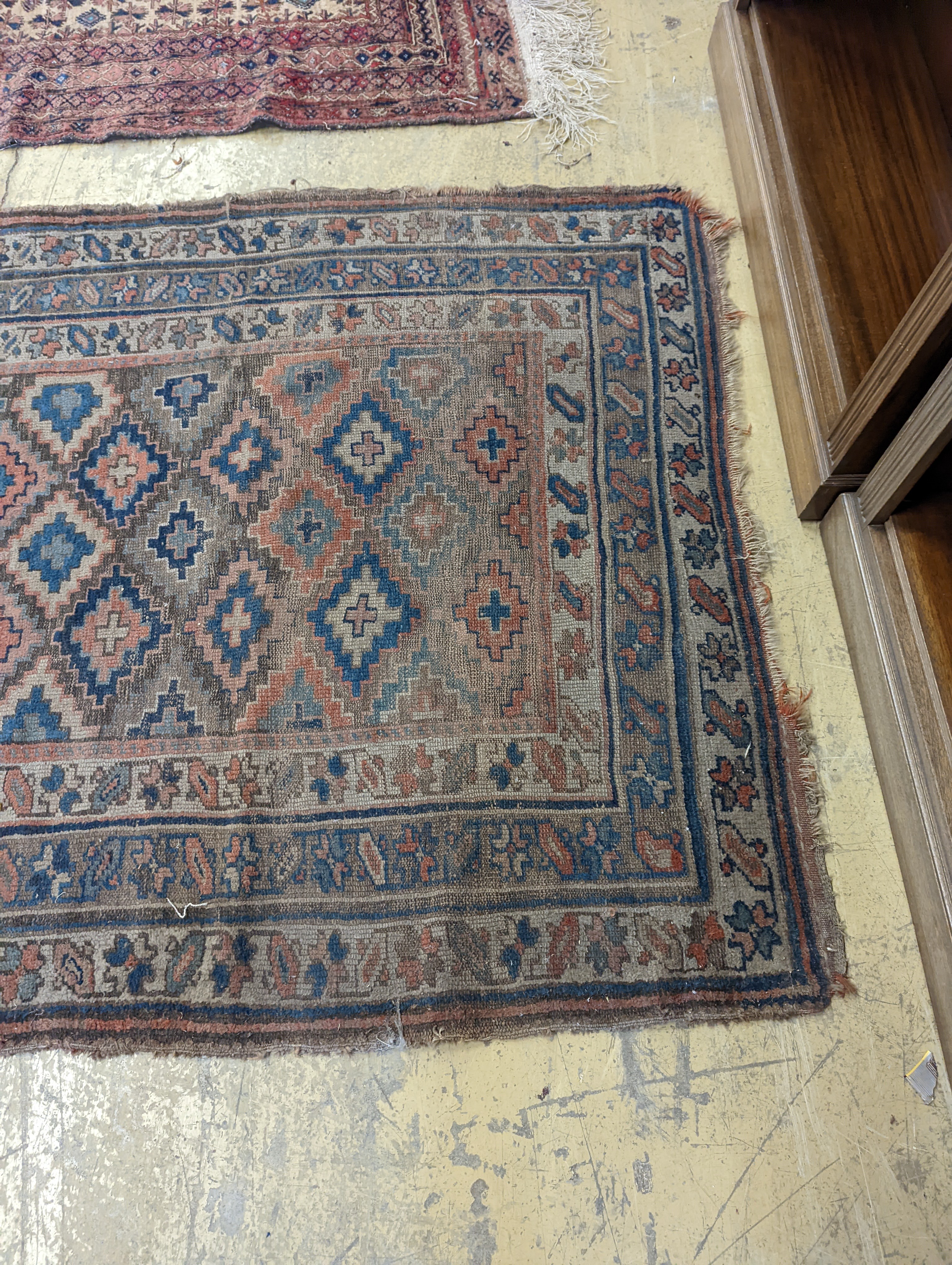 An antique Caucasian runner and a Belouch rug, larger 284 x 134cm